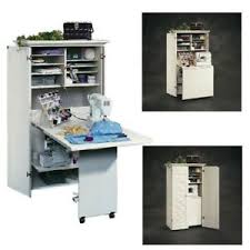 It can even covert even further out and make a really nice work surface. Craft Armoire Crafting Table With Storage Desk Organizer White Sewing Workstatio Ebay