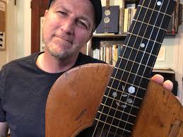 I FOUND MY STOLEN GUITAR! On Valentine's day 1998 my Lowden guitar was  stolen from the trunk of my car. That sucked, but the hardest part was that  there was an inlay