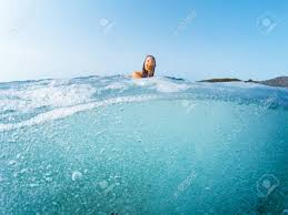 They aren't too expensive, and they are such a useful gadget to have. Girl At The Sea Coming Out Of The Water Half Underwater Photography Stock Photo Picture And Royalty Free Image Image 111361940