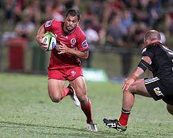 Karmichael hunt of the gold coast suns lays a solid bump into angus monfries of essendon. Karmichael Hunt Wikipedia