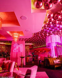 21st Birthday Table Decorations For Her Kylie Jenner Cuddles Up To Travis Scott And Takes Shot 21st Birthday Themes Birthday Party 21 21st Birthday Girl