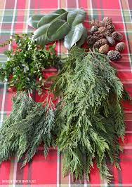 An easy diy to create your own lush garland table runner by lauren cermak of the southern lifestyle blog, going for grace. Diy Evergreen Table Runner Centerpiece The Easy Way Home Is Where The Boat Is