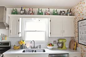 Home Tour Elsie S Kitchen A Beautiful Mess Above Kitchen Cabinets Small Kitchen Storage Small Kitchen