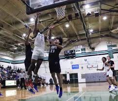 Kentwood basketball pulls away late against Curtis