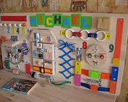 Pin By Marciafinkler On Baby In 2020 Busy Boards For Toddlers Busy Board Activity Toys