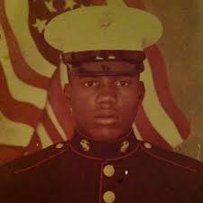 Can I help with brightening a dark military photo?