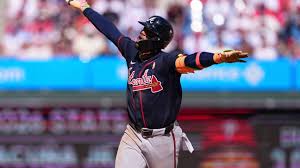 Ronald Acuña Jr. celebrates after hitting a game-tying home run against the Phillies