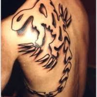 Some guys choose simple, small back tattoos and ink these designs on in the middle of their upper back. Awesome Back Tattoos Page 5 Tattooimages Biz