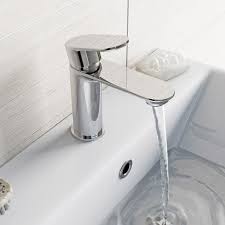 That big nut in the first picture that holds the tap base down has a rubber seal (or silicone) under it so you need to take that off and clean and dry under there. How To Fit A Basin Mixer Tap Victoriaplum Com