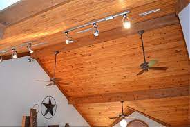 Vaulted ceilings can create a striking look in any room, making if you have a vaulted ceiling, the best place to hang pendant lights is from the center beam. Ceiling Fan And Track Lighting On A Vaulted Ceiling Rustic Kitchen Lighting Farmhouse Lighting Dining Vaulted Ceiling Kitchen