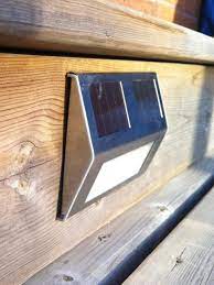 Keep The Party Going All Night Long With These Illuminating Fixtures That Are Easy To Install And Enjoy No Solar Deck Lights Solar Step Lights Deck Lighting