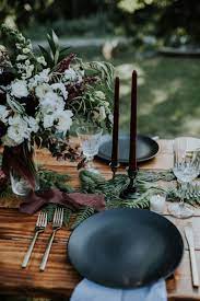 Black and gold bohemian wedding. Amazing Boho Moody Table Setting With Black Plates And Candles For Sydney And Dylan S Intima Winter Table Setting Dinner Table Setting Wedding Reception Tables