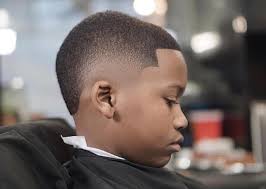 Faded sides with shaved line. 35 Popular Haircuts For Black Boys 2021 Trends