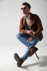 Chelsea boots have been around since the victorian era and have a slim silhouette with elastic sides and normally feature a little tab or loop on the back, by the heel, so you can slip them on and off easily. How To Wear Chelsea Boots 10 Great Looks For Men A Gentleman S Row