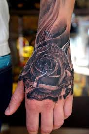 Rose Tattoo Hand Placement Hand Tattoos Hand Tattoos For Guys Rose Tattoos For Men