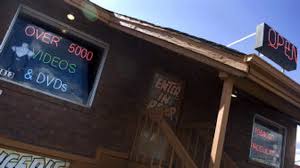 City, porn shops settle