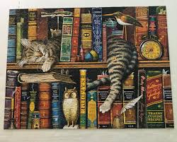 These cute cats really wish they could get to the strawberry shortcake that serves as the centerpiece of kitchen countertop. The Cats Of Charles Wysocki Frederick The Literate 750 Pieces Buffalo Jigsawpuzzles