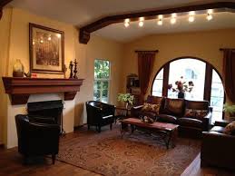 Simple black and white photography and a wrought iron candelabra for the. Spanish Style Living Room Furniture Modern Design From Warm Inviting Spanish Style Living Room Decor Pictures