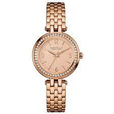 Off white with light gray, black, and gold tone detail. Caravelle Designed By Bulova Caravelle Women S Rose Gold Watch Steel Crystal Analog Walmart Com Walmart Com