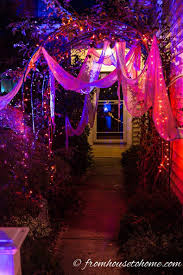 For great halloween lighting effects one always needs some black lights and some strobe lights, throw halloween costume ideas for men women and kids. Halloween Outdoor Lighting Ideas 21 Spooky Ways To Light Your Yard Entertaining Diva From House To Home Outdoor Halloween Halloween Lighting Outdoor Halloween Yard