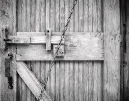 In 2016, missmustardseed decided to use farmhouse white to quiet down the barn door top of her dining room table. Old Barn Door In Black And White Photograph By Ann Powell