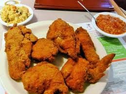 Roll in bread crumbs, pressing crumbs into chicken; The Best Fried Chicken Restaurants In The Country Restaurants Food Network Food Network