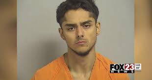 Man holds suspected burglar at gunpoint in east Tulsa