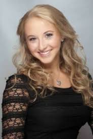 University High student's Little Toy Train Fund plays Santa at Christmas