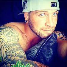 Pin By Carole Stevens On Tattoos Gorgeous Eyes Backwards Hat Hot Guy With Tattoos