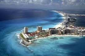 Cancún is a coastal city in the popular vacation destination called the mexican caribbean , more officially known as the state of quintana roo , on mexico 's yucatan peninsula. Travel Guide Top 10 Things To See And Do In Cancun