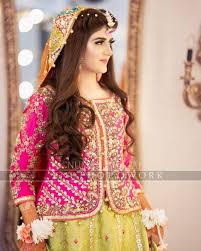 This Dress Is Wore By Brides From Pakistan And India Mostly On Their Mehndi Mayoon Dho Bridal Dresses Pakistan Pakistani Bridal Dresses Bridal Mehndi Dresses