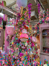 A selection of christmas tree decorations on a bed of tinsel. Inspirational Christmas Displays From Guess And Company The Gifted Gabber