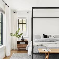 This modern upholstered headboard adds a certain edge to your bedroom, but the light pink and caramel leather design feels feminine and approachable. 17 Beautiful Gray And White Bedrooms