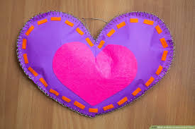 This card starts out as a heart, but with the origami folds it looks more like a valentine envelope to the recipient until they unfold the card! 5 Ways To Make A Heart Out Of Paper Wikihow