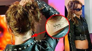 It is suppose to translate to healing. Britney Spears Tattoo Ideas Foot Tattoos Design