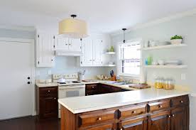 Black upper and white lower kitchen cabinets cupboard door materials modern kitchen cabinetry. Painting Our Upper Cabinets White Young House Love