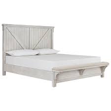 Brynhurst queen upholstered bed with storage bench featuring classic crown moulding and a warm wood finish, this generously scaled bed will make a beautiful statement in any bedroom. Signature Design By Ashley Brashland Queen Bed With Footboard Bench Royal Furniture Panel Beds