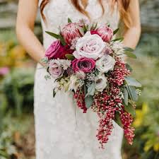 Rustic bouquets and rustic weddings go hand in hand and this particular arrangement of flowers is truly something special. 27 Stunning Cascading Bouquets For Every Type Of Wedding Brit Co