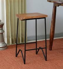 gemini solid wood bar stool in natural acacia finish by bohemiana
