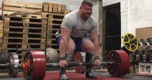 Squat raw with knee sleeves: Watch Luke Richardson Axle Bar Deadlift 838lb For A Triple Barbend