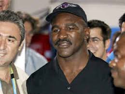 Defiant Holyfield fights on