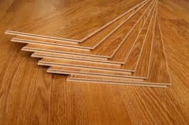 Laminate imitates wood, and vinyl. Laminate Vs Hardwood Flooring Pros Cons Comparisons And Costs