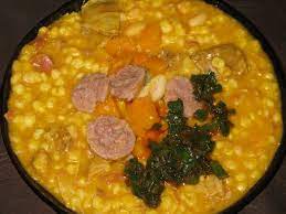 Along with the cooked hominy, meat is usually included which can be beef (often on the bone), tripe, or chorizo. File Locro Argentino Jpg Wikimedia Commons