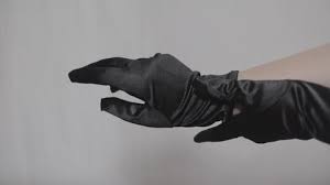 For a secure grip on the handle of the motorcycle, these gloves are fingerless. Satin Glove Stock Video Footage 4k And Hd Video Clips Shutterstock