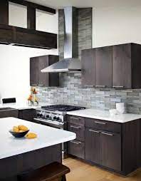 White Almost Pearl White Counter Tops To Match With The Dark Stained Cupboards An Modern Kitchen Backsplash Modern Kitchen Cabinet Design Modern Kitchen Design