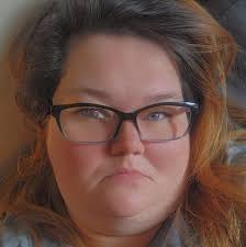 Cops and sheriffs surround a house