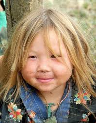 I have dark brown eyes and naturally blonde hair. How rare actually is  this? Google just gives me mixed results.