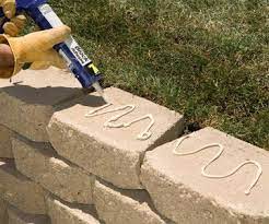 Building A Interlocking Block Retaining Wall Diy Retaining Wall Retaining Wall Backyard Landscaping