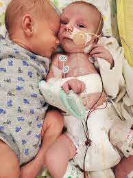 Meet #HeartAngel Kane. ❤ He was born with multiple congenital heart defects (#CHDs). After his 5th open-heart surgery, he suffered a traumatic brain injury - one of the complications that can happen