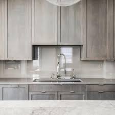 Design Aspects To Consider In Contemporary Kitchen Renovation Gray Stained Cabinets Staining Cabinets Gray Quartz Countertops